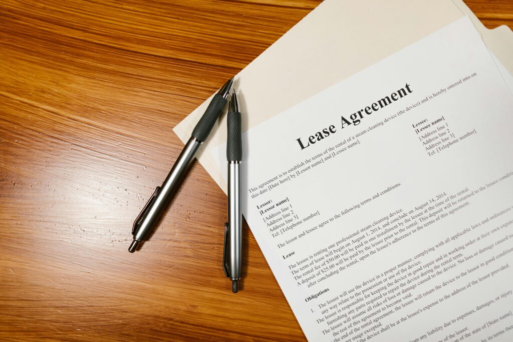 Lease Agreement with two pens on a desk
