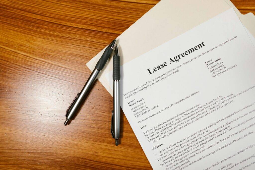 Lease Agreement with two pens on a desk