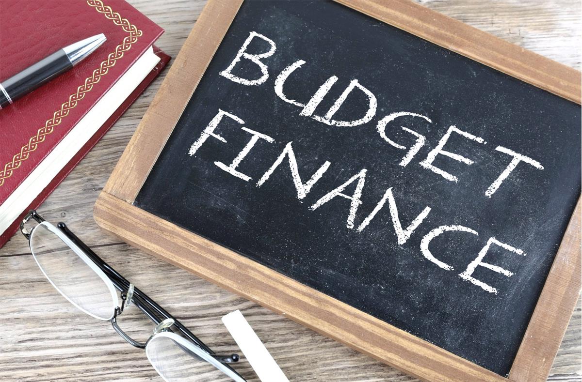 image with the words “budget finance” written on a blackboard